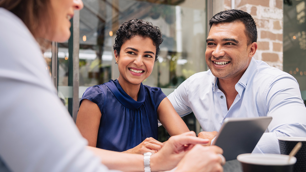 Couple having conversation with the advisor